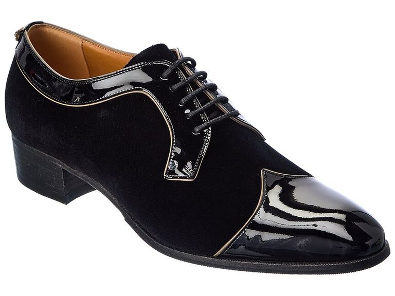 Black loafers with shiny detailing. 