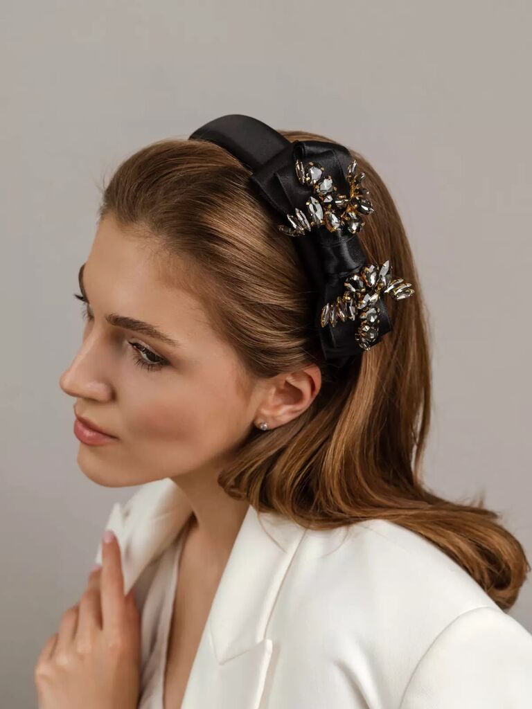 Black headband with a silk bow by Elena Honch. 