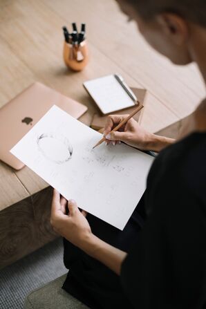 Event Planner Sketching Out Wedding Ceremony Design