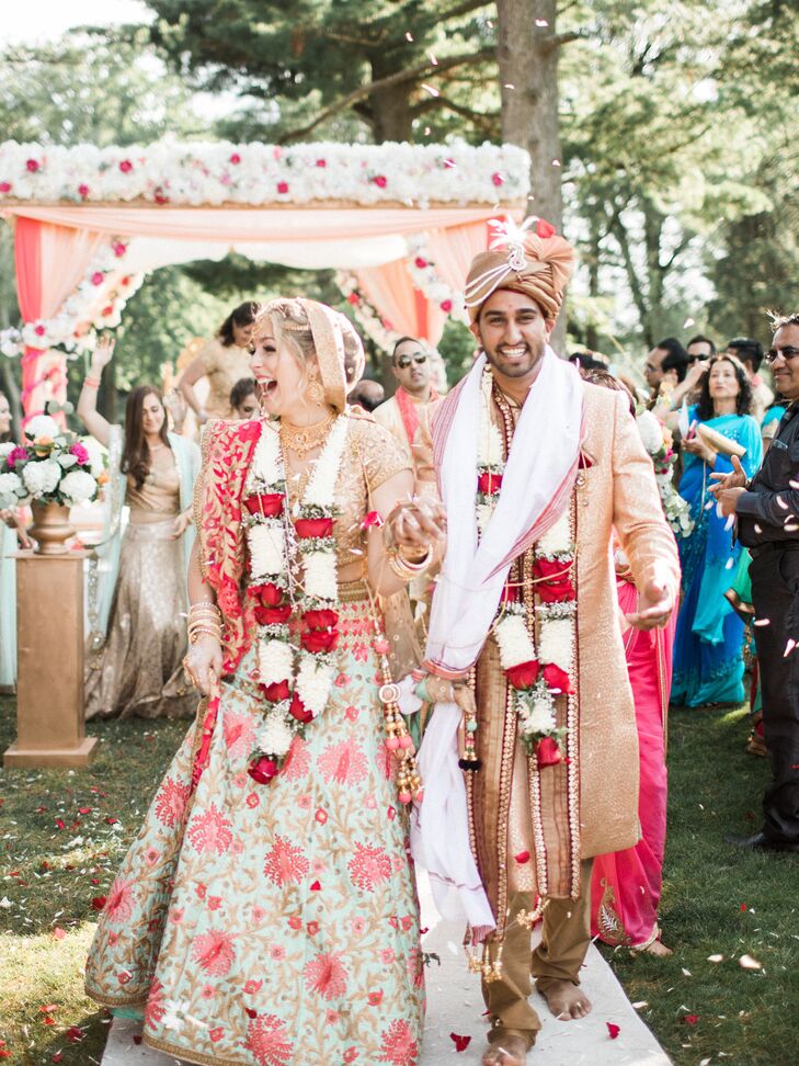 "We wanted our wedding to bring our two sides of the family together so that affected every decision we made," says Arselie. One of those decisions was to have customized programs at both the Catholic and Hindu ceremonies so each side could follow what was happening.
