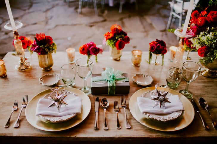 As a thank-you to their guests for traveling to Mexico to share their wedding day, Marian and Dillion gave their families and friends silver-star ornaments that mirrored the canopy of lanterns that hung over the tables. The mementos were placed on top of each setting, giving the classic tablescapes an element of glitz and glamour.