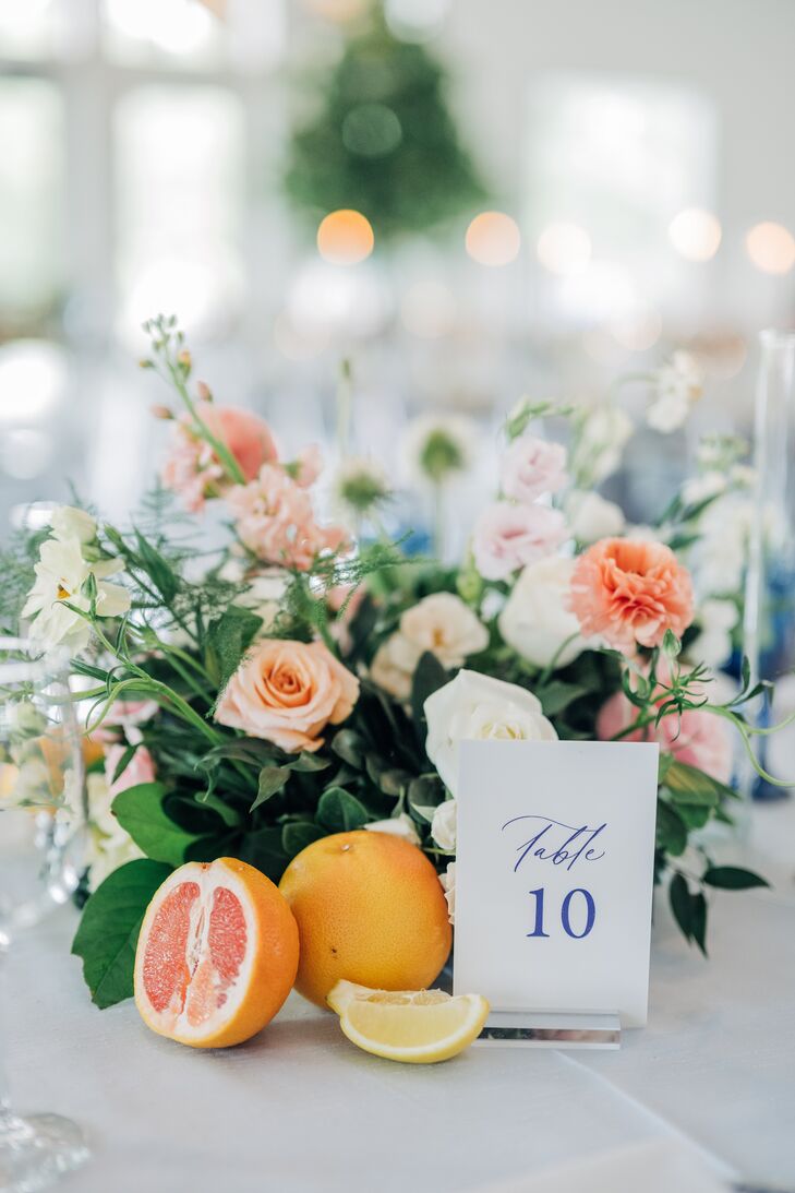 Table Numbers With Bouquet of Peace and Blush Flowers and Citrus