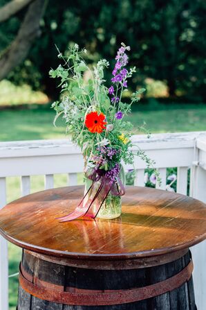 Barrel Cocktail Table With Wildflower Centerpiece