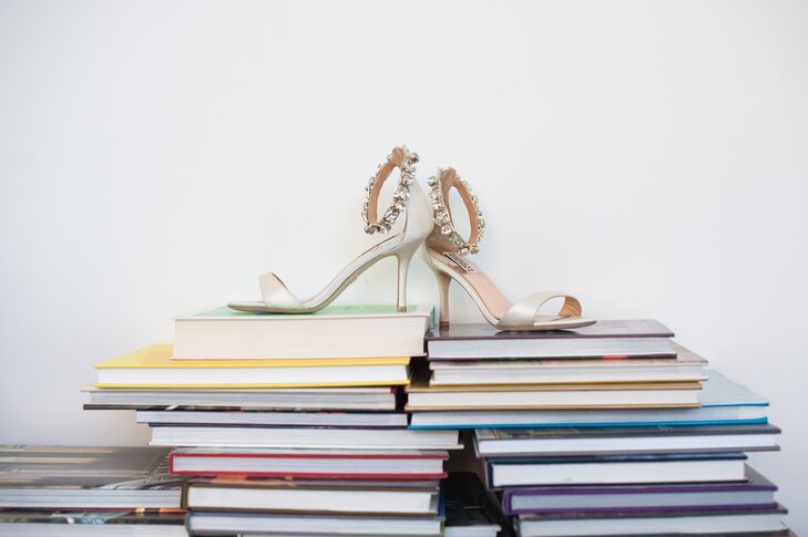The bride completed her look with a pair of ivory, peep toe Badgley Mischka heels with a beaded ankle strap.