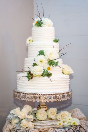Ivory Wedding Cake with Roses and Daisies
