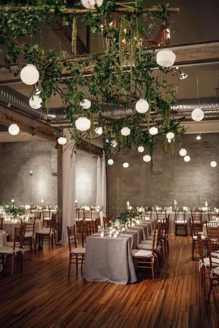 With a background in historic preservation and city planning, Samantha knew that a standard catering hall just wouldn’t do for her September nuptials to Brian. “I wanted an old, adapted space, something that reflected the heritage of Philadelphia,” Samantha says. They settled on the idea of an industrial loft and quickly found a venue that ended up falling through. But it didn’t take long for Front and Palmer in northern Philadelphia to fall onto their radar. “The space was an adapted factory practically underneath the elevated train,” Samantha says. “It was gritty and soft all at once, and we loved it immediately.”