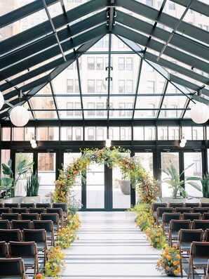 Ceremony in Modern Glass Space, Bright Wildflower on Aisle and in Ceremony Arch