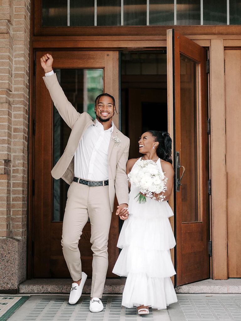 Simone Biles walking out of wedding venue with husband Jonathan Owens
