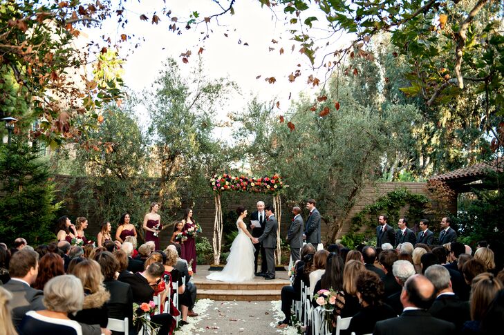 Under the shade of old-growth sycamore trees, Lauren and Phil exchanged heartfelt vows as their family and friends looked on. The pair gathered their guests in the Garland’s Beverly Park, a quaint urban oasis complete with a refined stone fountain, cozy fireplace, lush flora and beautifully manicured lawns.