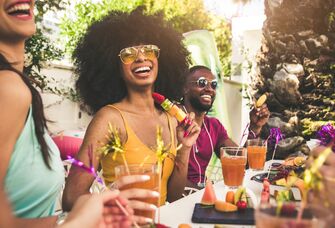 friends having fun at backyard home party