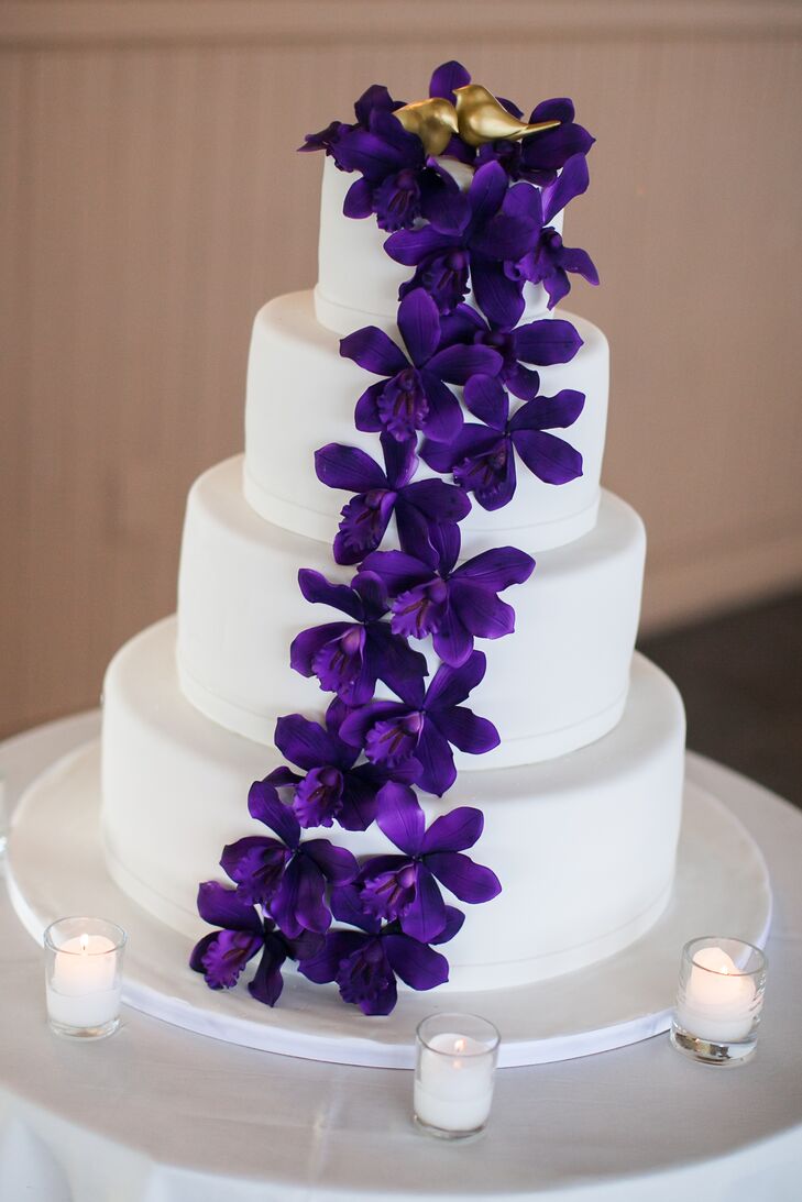 Four-Tier Wedding Cake With Purple Flowers