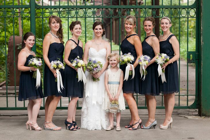 Lauren chose navy chiffon dresses from J.Crew for her bridesmaids to wear, with the hope that they could wear their dresses again. "I think they ended up looking fantastic," she says. "Also most of the girls have worn their dresses again, so I feel like that's a win."