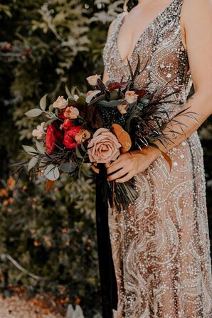 Blush Wedding Gown With Moody Blooms