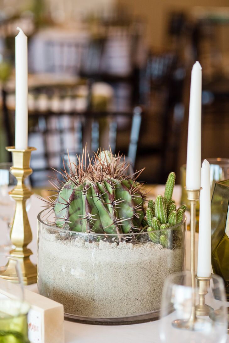 Keeping with the desert theme, each reception table was topped with copper- and gold-hammered bowls, which were filled with various cacti and sand.
