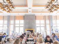 Guests enjoy a chic bridal shower. 