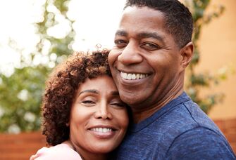 Two parents smiling