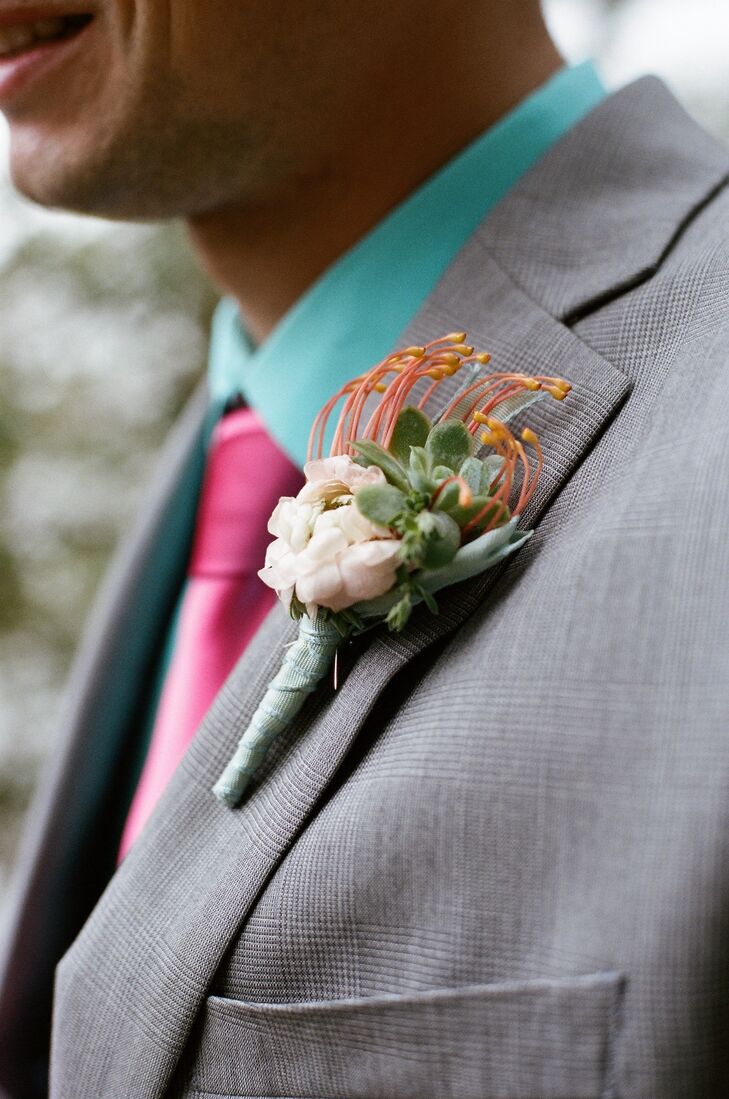 Mickey wore a unique boutonniere that paired a pincushion protea with a small succulent and zinnia.