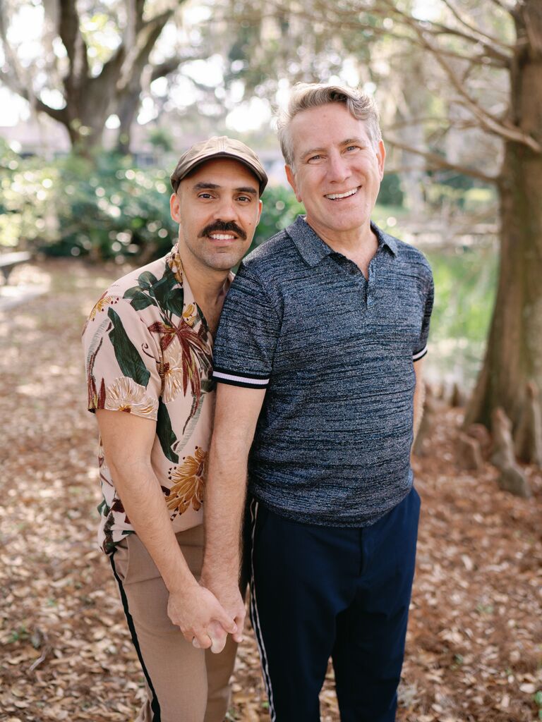 Two gents smile for the camera in this adorable engagement photo