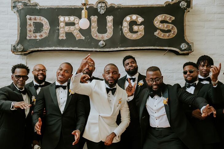 Groom in White Tux Jacket and Groomsmen in Black Tux Jackets With Bright Boutonnieres, Vintage Pharmacy Drugs Sign