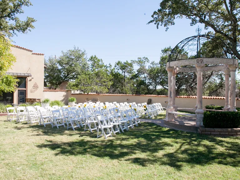 Outdoor ceremony space at Tuscan Hall & Veranda Room wedding venue in Austin, Texas