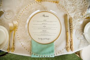 Gold-Beaded Clear Charger with Gold Flatware