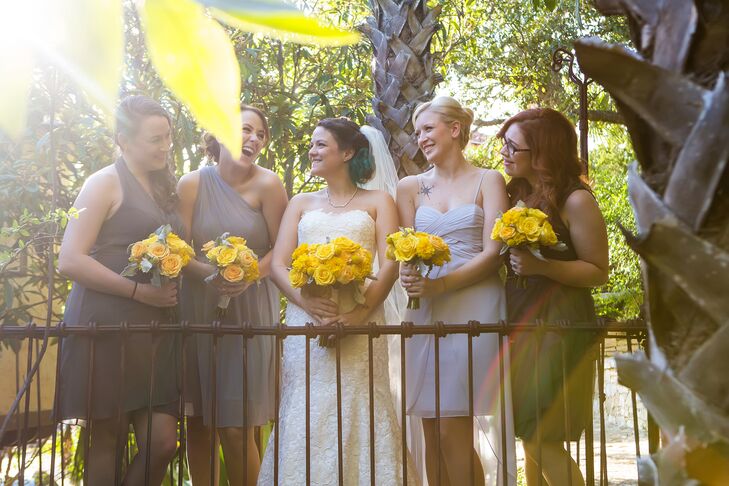 Lauren loves the eclectic dress trend and wanted each bridesmaid to find a dress to suit her body type and complexion, so she let each of her bridesmaids choose their own gray dress.
