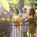 Lauren loves the eclectic dress trend and wanted each bridesmaid to find a dress to suit her body type and complexion, so she let each of her bridesmaids choose their own gray dress.