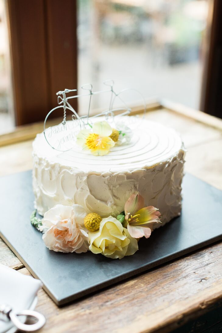 The River Cafe catered to Jennifer's dairy allergy, and even made a delicious chocolate zucchini cake. A silver wire bicycle topper highlighted Jennifer and Jason's love of biking through Princess Island Park.
