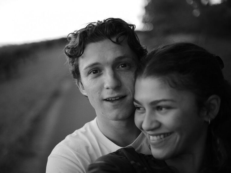 Black and white snapshot of Zendaya and Tom in an embrace.