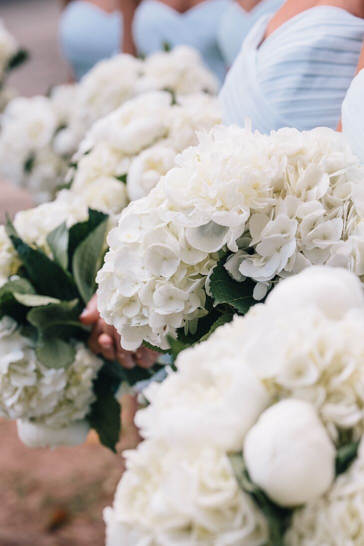The bridesmaids carried white hydrangea and peonies.