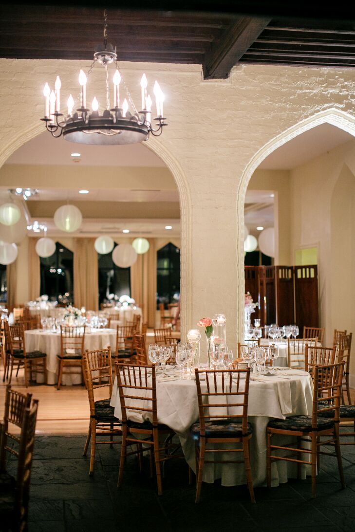 The reception was held indoors at Aldie Mansion. The venue, with its 1920s style, had candelabra chandeliers and beautiful arches throughout the hall.