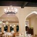 The reception was held indoors at Aldie Mansion. The venue, with its 1920s style, had candelabra chandeliers and beautiful arches throughout the hall.