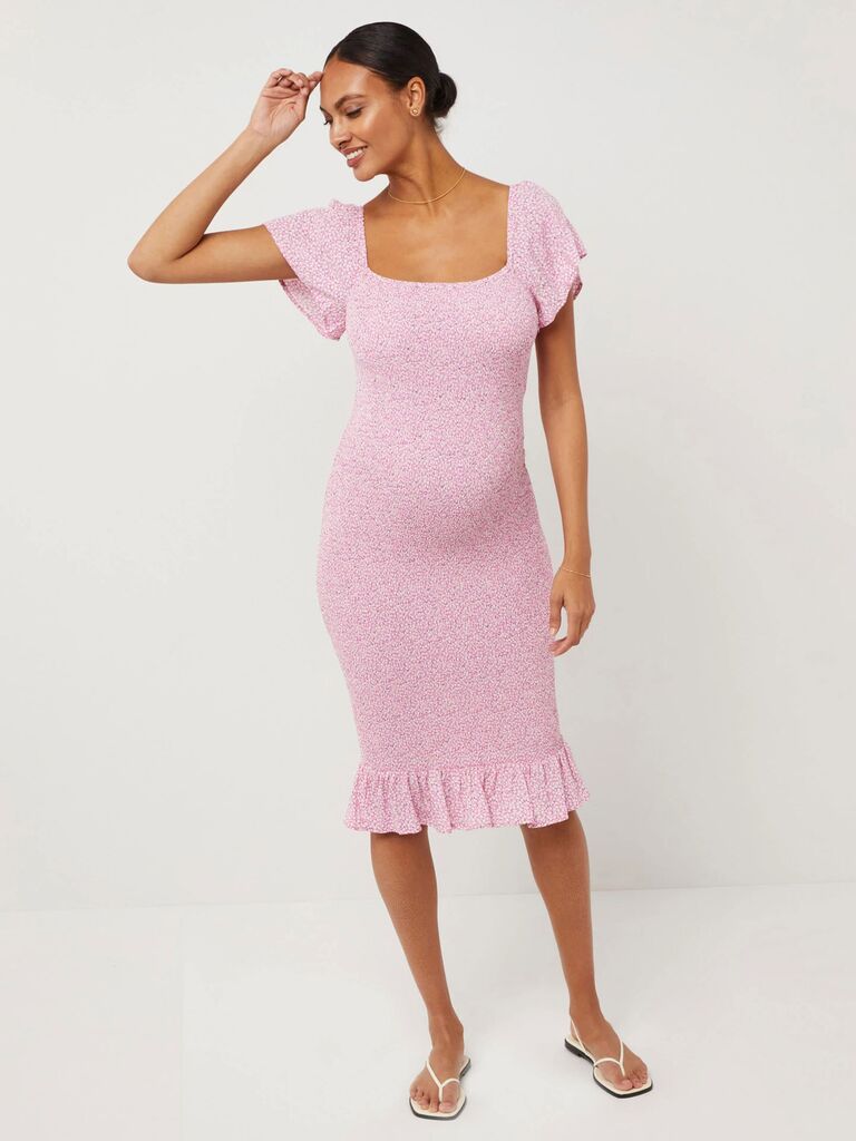 A Pea In the Pod summery floral maternity ddess for wedding guests with pink floral design