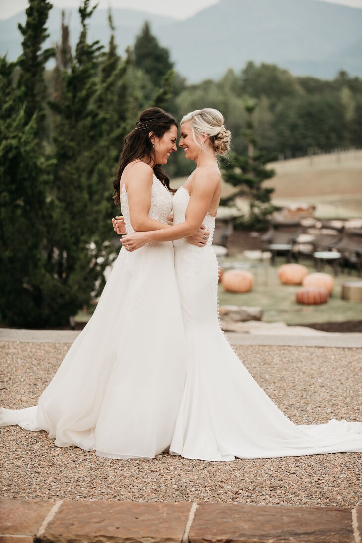 Brides Sharing Hug During Wedding Portraits at Hotel Domestique in Travelers Rest, South Carolina
