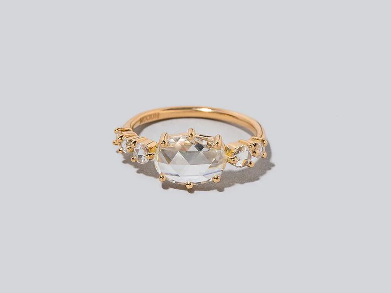 unique oval engagement ring with east-west setting