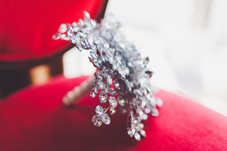 My-Lee held a bouquet of crystal stems that were tied with a neutral tone bouquet wrap, with her bridesmaids holding matching crystal bouquets as well.