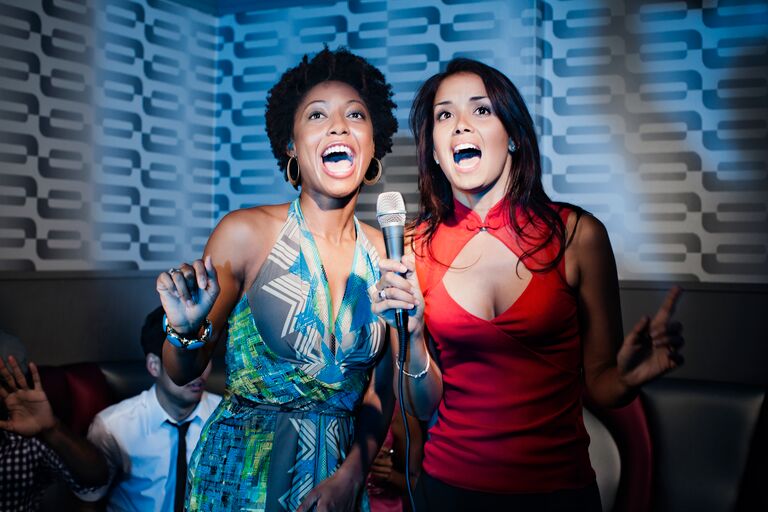 Friends singing a Karaoke Duet SOng