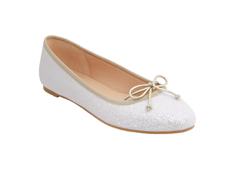 White ballet flat with shimmering accents and a chic bow on top