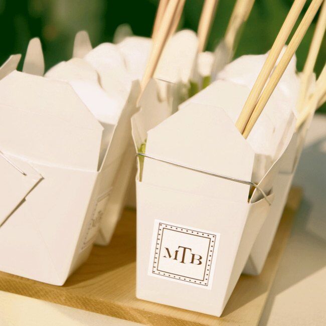 In keeping with the theme, Chinese take-out boxes filled with spicy beef lo mein were emblazoned with the couple's monogram.