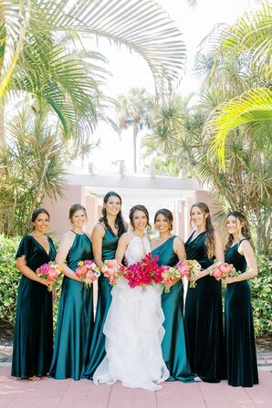 Bride Posing With Bridesmaids in Emerald Dresses at The Vinoy Renaissance in St. Petersburg, Florida