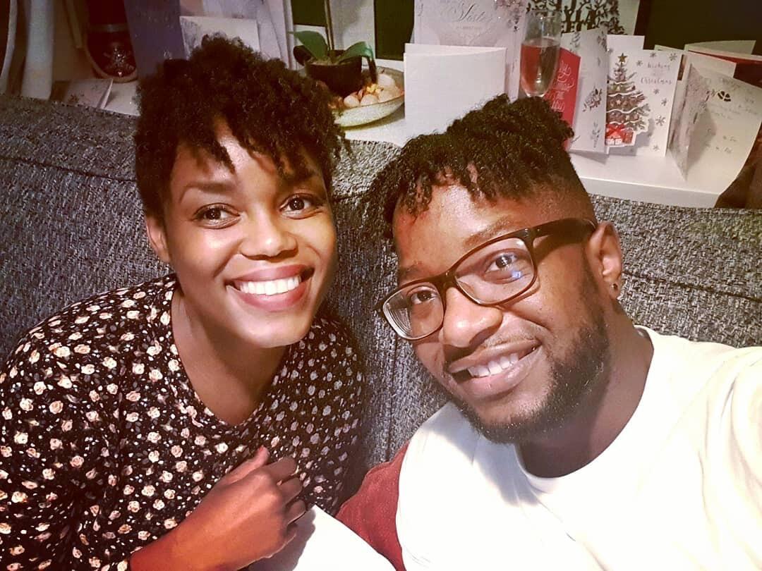 The first Christmas we spent together. We were accused of planning to have matching hairstyles  but that was not the intention. George had twists, and Panji had a twist out. Clear distinction. 