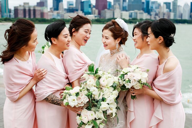 Modern Bridesmaids with Pink Dresses, Pink Shawls and White Bouquets