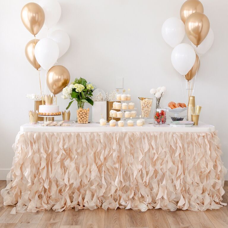 Champagne gold table skirt for a bachelorette party. 