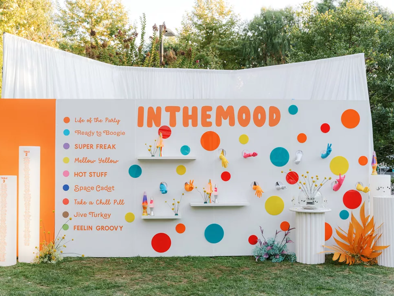 Mood ring card display for a 60s-themed wedding reception