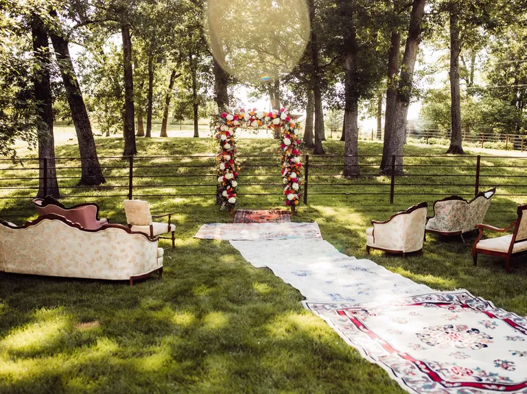 Vintage Rugs Decorated This Backyard Wedding Ceremony