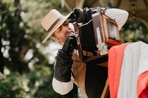 Photo Booth Technician at Glamorous DIY Backyard Wedding