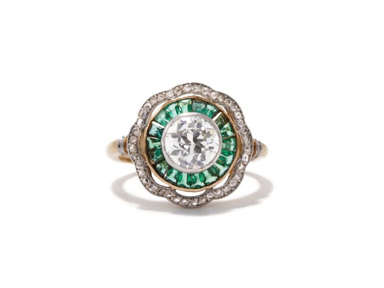 vintage diamond ring with emerald halo