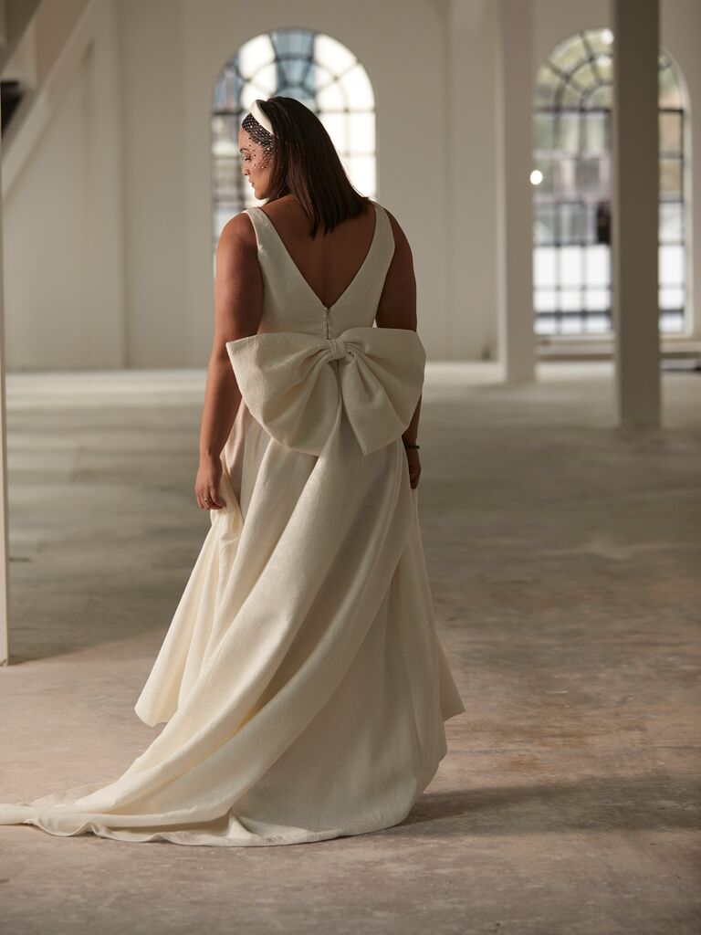 White 2024 wedding dress with large bow detail 