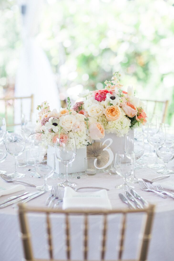 Emmy Star Brown, a family friend and artist, made every table number for the Naples, Florida, reception. The white painted numbers were encased in a block of acrylic material, giving it a modern, clean look.