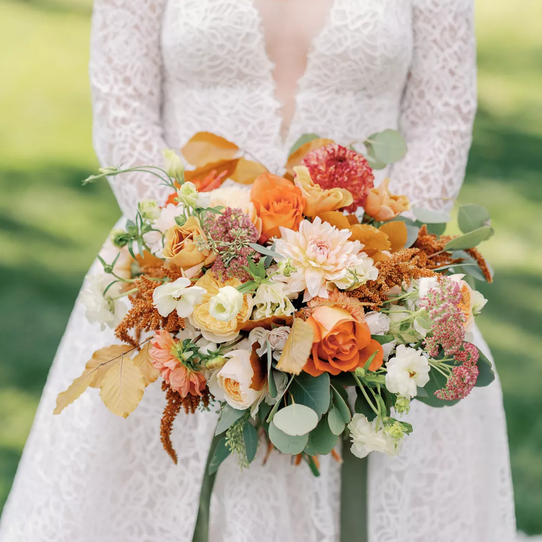 Autumnal wedding bouquet in orange tones